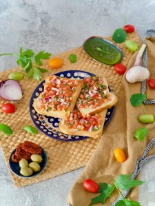 Bruschetta on toasted white bread with garnishes