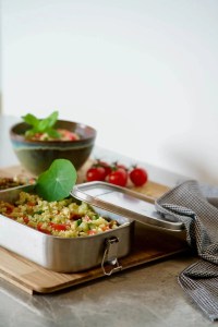 Vegan Bulgur Salad packed in a lunch box with the lid open