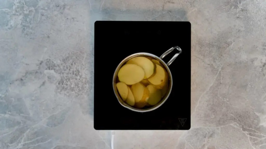 Potatoes cooking in a pot