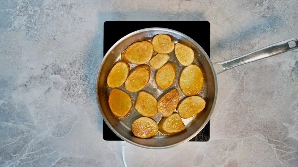 potato slices being roasted