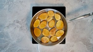 potato slices being roasted