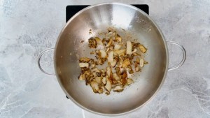 mushrooms being roasted in a pan