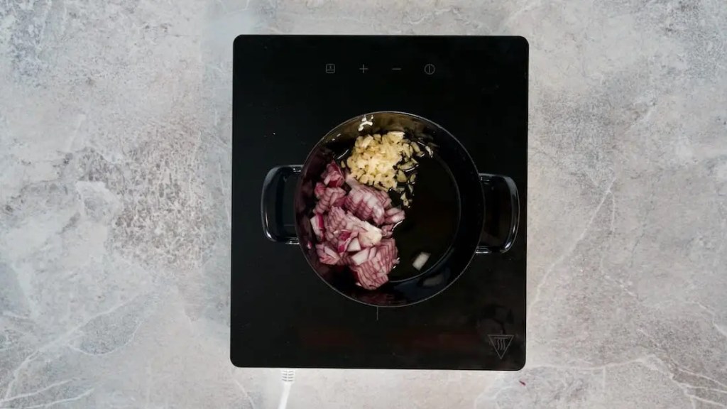 White bean salad fried onions in a pan