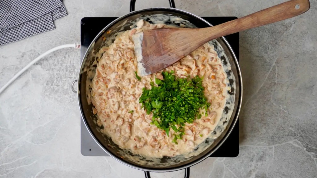 Chanterelle mushrooms finished and stirred parsley