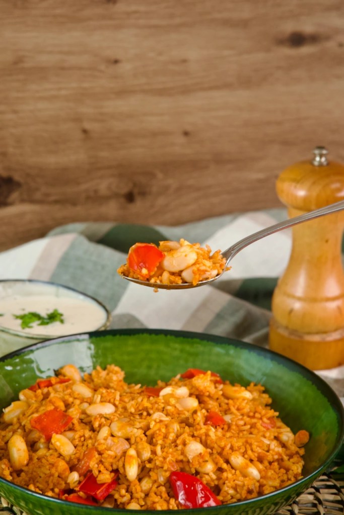 Rice and Beans scoop the beans and rice